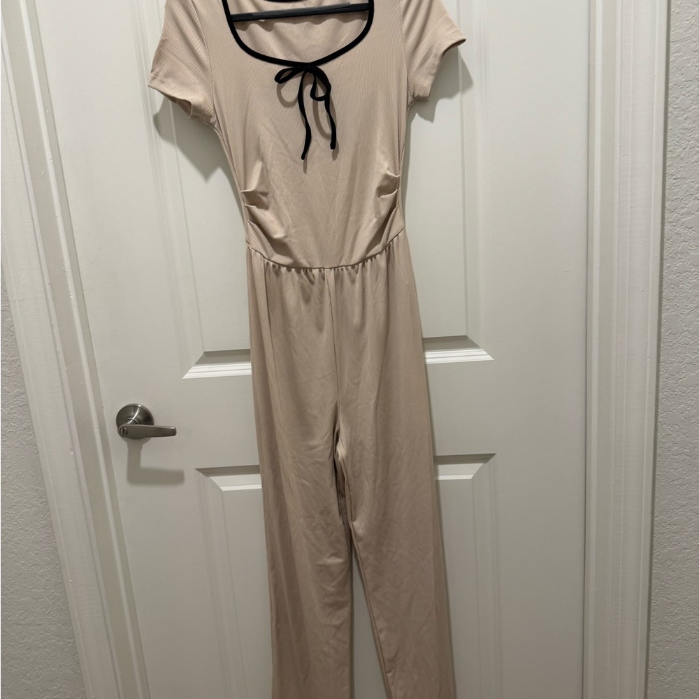 Elegant Cream Jumpsuit with Black Trim